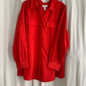 Red button down long sleeve womans blouse.